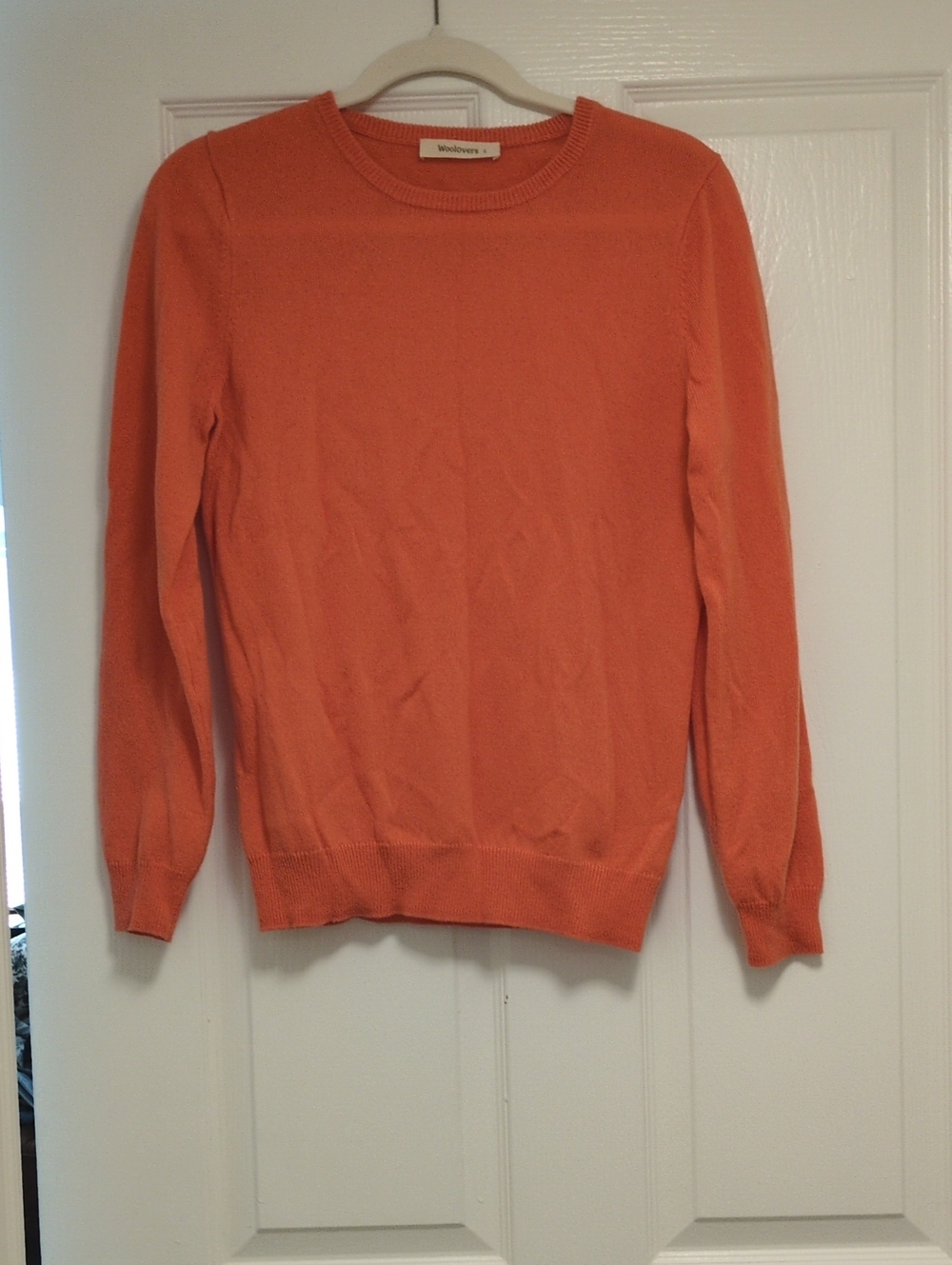 Woolovers Women’s Crewneck Sweater in Coral Orange